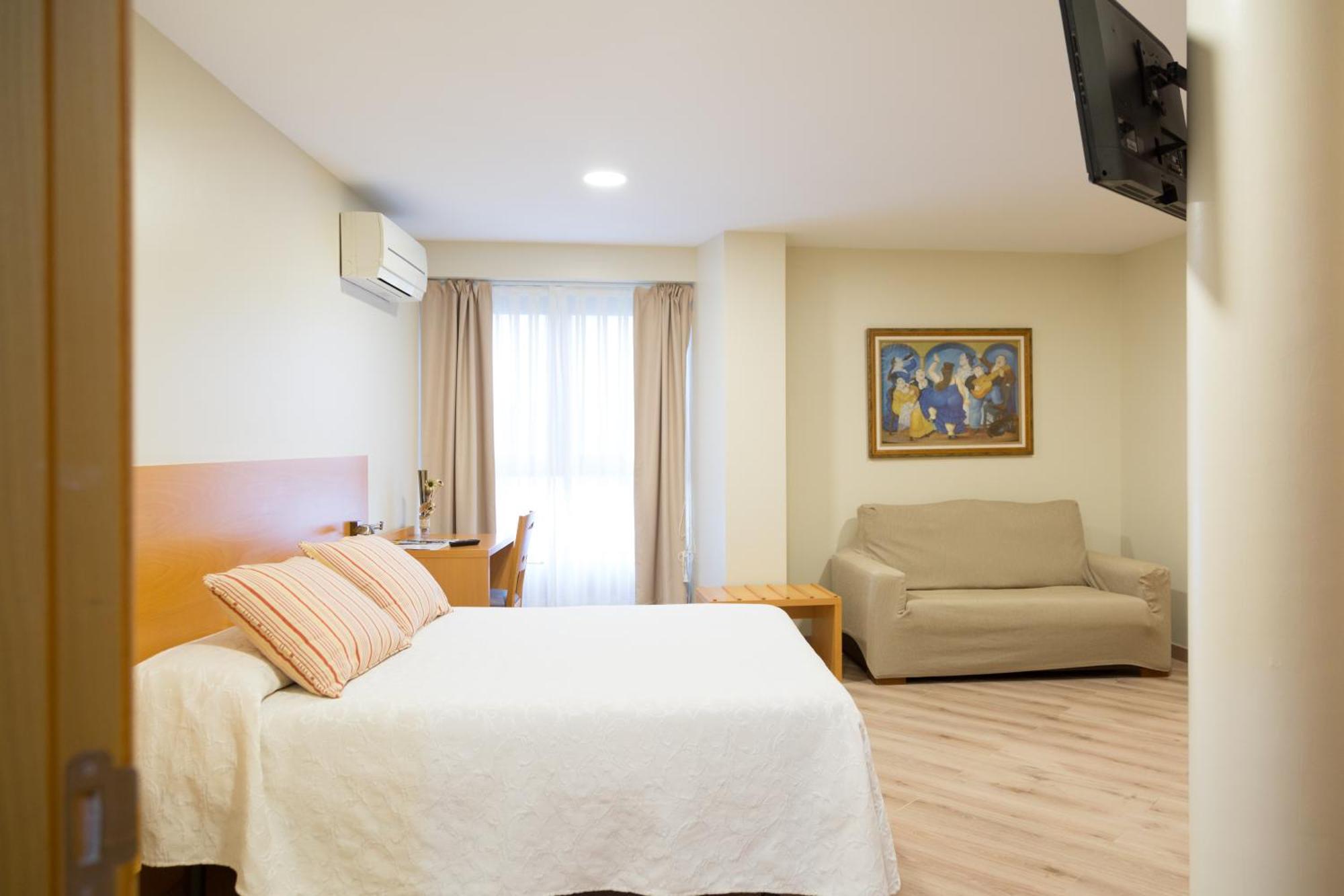 Apartamentos Playa De Cóbreces Buitenkant foto