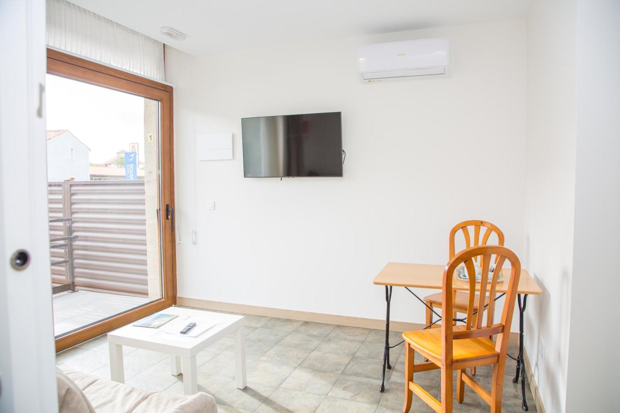 Apartamentos Playa De Cóbreces Buitenkant foto